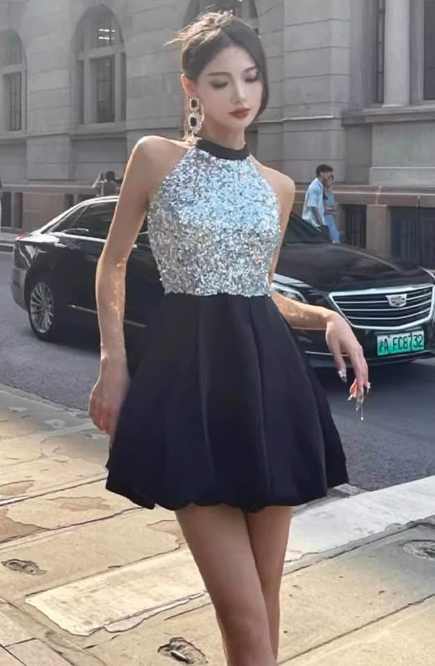 Silver top with black skirt